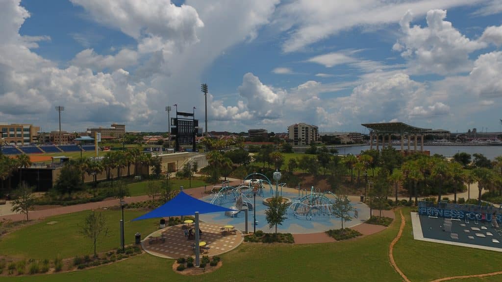 Ariel view of blue shade sails installed over a park sitting area at Wahoo Statum by Emerald Coast Shade in Panama City Beach Florida